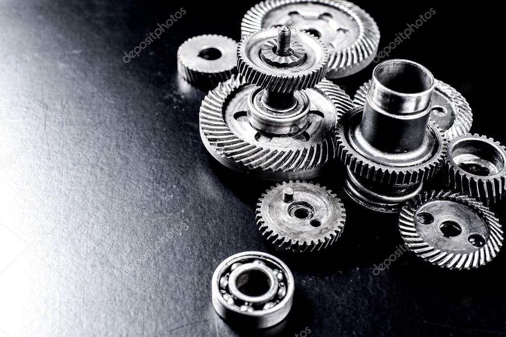 Mechanical components on black background
