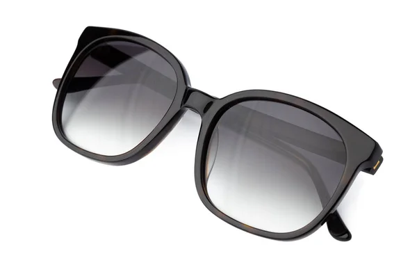 Стильні сонцезахисні окуляри ізольовані на білому тлі, крупним планом — стокове фото