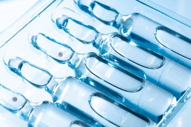 Enjeksiyonlar için ampul şişelerinin tıbbi arka planı