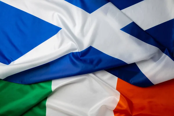 Bandiere della Scozia e dell'Irlanda piegate insieme — Foto Stock