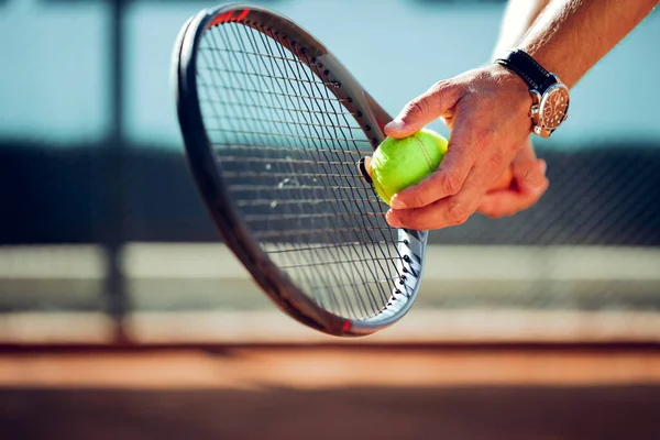 stock image Tennis players hand preparing to take a serve