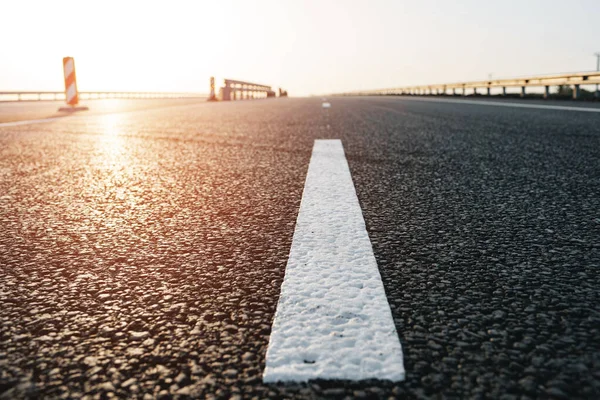 White marking line on asphalt road on highway — Stock Photo, Image