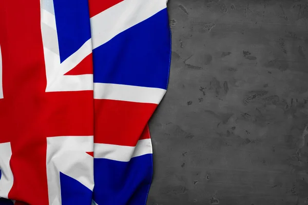 Flagge des Vereinigten Königreichs auf grauem Hintergrund — Stockfoto