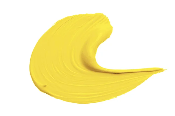 Желтый жидкий фундамент пятна на белом фоне — стоковое фото