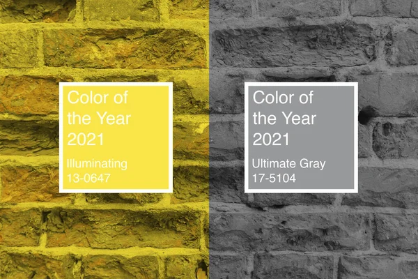 Цегляна стіна пофарбована в кольори 2021 року Ultimate Gray and Illuminating — стокове фото
