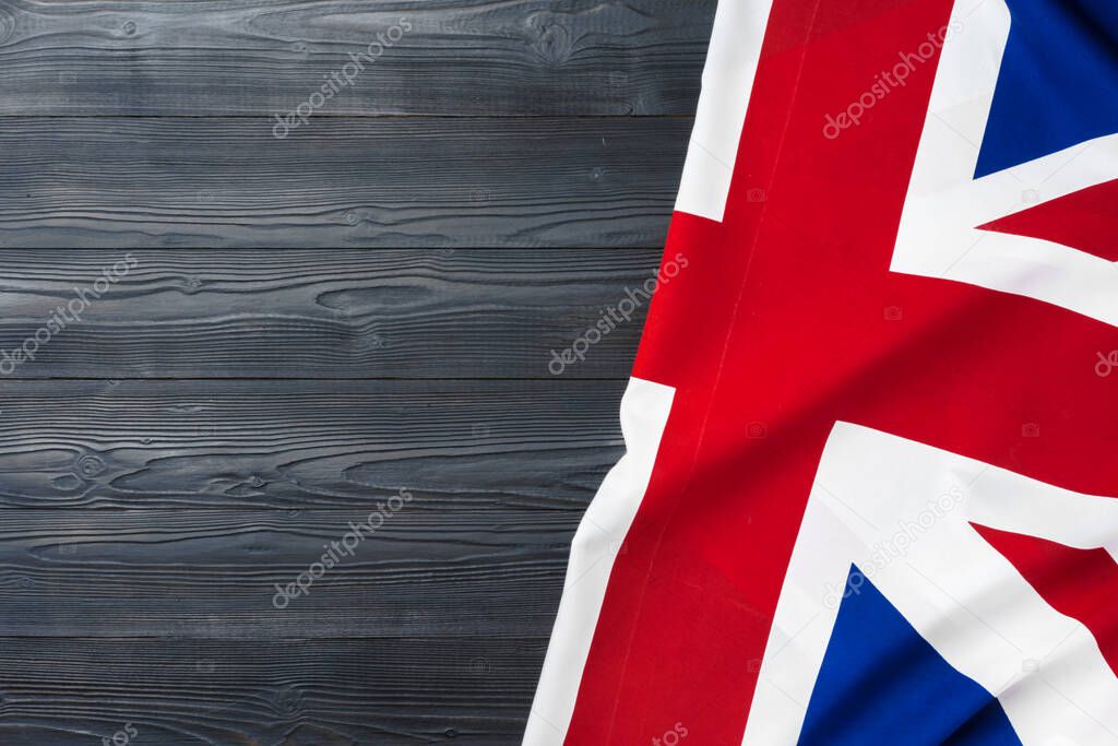 Flag of United Kingdom on wooden background