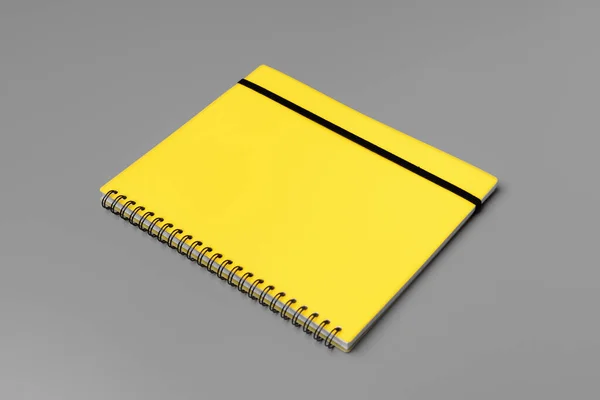 Carnet jaune sur fond gris gros plan — Photo