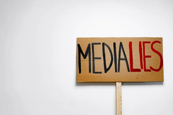 Protest placard against fake news about outbreak 2019-nCoV and treatment — Stock Photo, Image