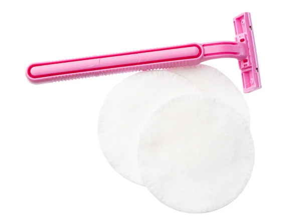 Cotton pads and disposable razor isolated on white — Stock Photo, Image