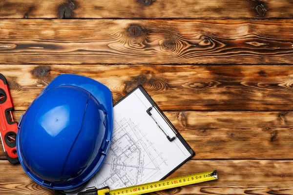 Bauarbeiter-Hardhat, Baupläne und .construction level, Draufsicht — Stockfoto