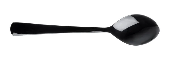 Plastic black spoon isolated on a white background — Stock Photo, Image