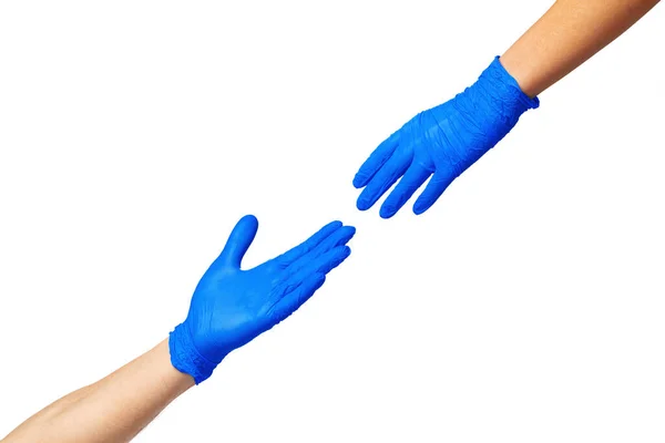 Male and female hands in medical gloves stretch to each other. Help concept. — Stock Photo, Image