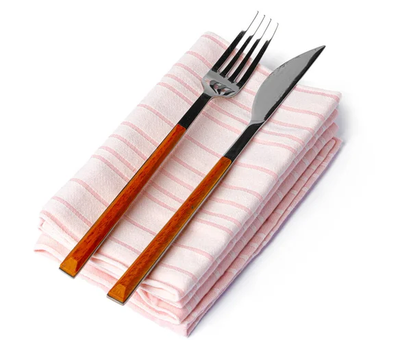 Havluda çatal ve bıçak seti. Beyaz arkaplanda izole.