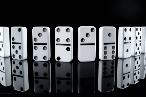 White dominoes in the dark close up — Stock Photo, Image