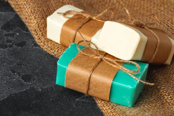 Soap bars with natural ingredients on the table — Stock Photo, Image