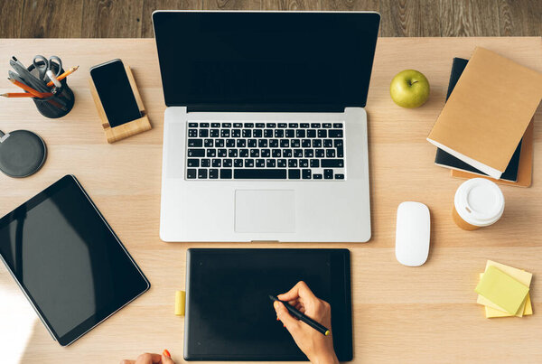 Stay safe and working from home. Young woman working at home.