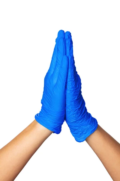 Hands in blue latex medical gloves folded together indicating the process of prayer. — Stock Photo, Image