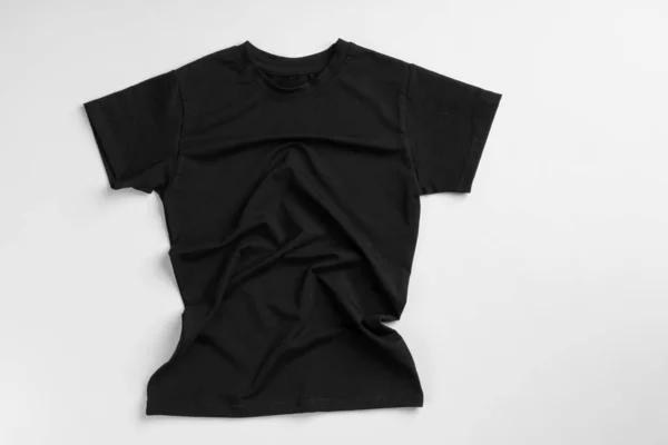 T-shirt tinta unita nera con spazio copia — Foto Stock