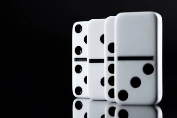 Close up of Domino pieces on black background — Stock Photo, Image