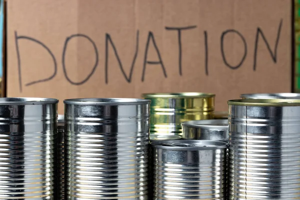 Donaciones de comida en la mesa. Donación de texto. — Foto de Stock