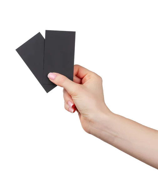 Mano femminile in possesso di biglietto da visita nero isolato su sfondo bianco — Foto Stock