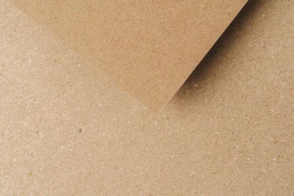 Brown recycled carton paper sheets close up
