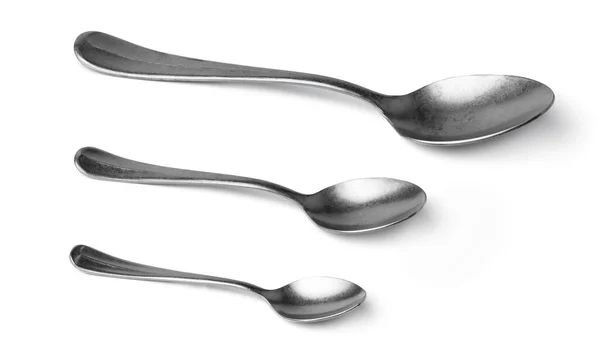 Set of silver spoons cutlery isolated on white — Stock Photo, Image