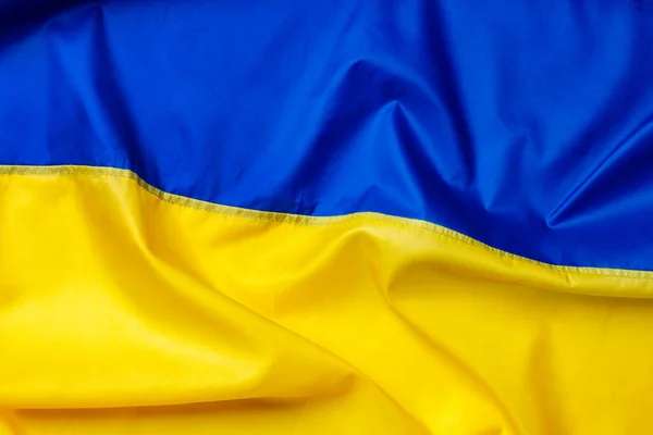 National flag of Ukraine textile background — стокове фото