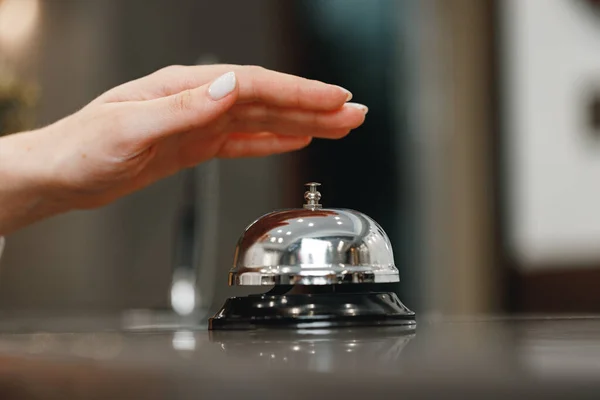 Hotel service bell on front desk counter