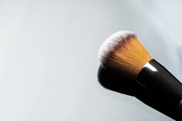 Professional dark make up brush, close up.