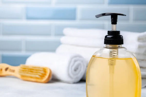 Liquid soap or body lotion set at hotel bathroom