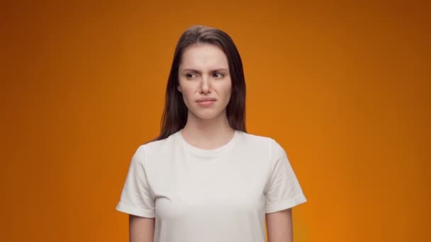 Close up of a woman closing nose bacause of a bad smell — Stock Video