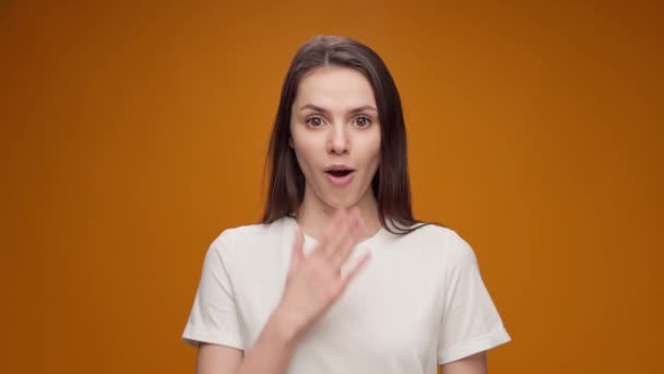 Portrait of woman shocked and surprised with good news — Stock Video