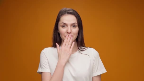 Portrait of woman shocked and surprised with good news — Stock Video