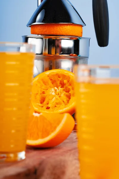 Metal hand orange juice squeezer close up