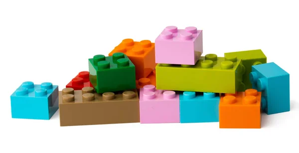 Colorful plastic toy building blocks isolated on white — Stock Photo, Image