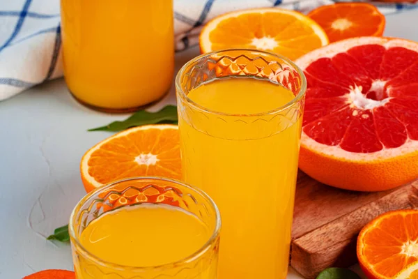 Orange juice cup on table close up