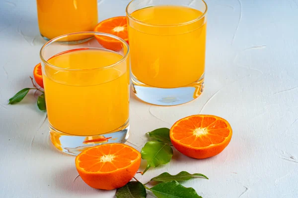 Orange juice cup on table close up — Stock Photo, Image