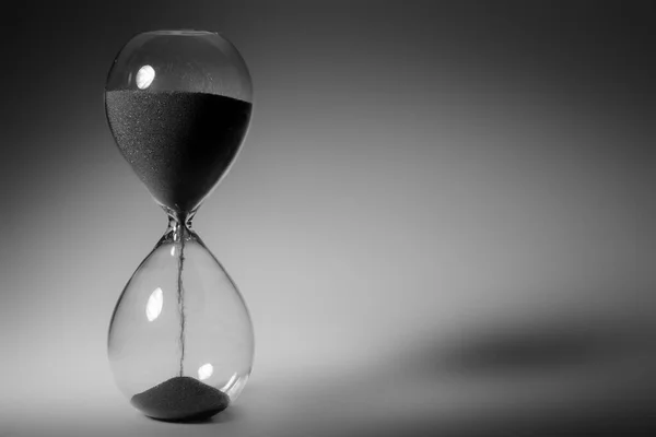 Black and white photo of hourglass close up — Stock Photo, Image