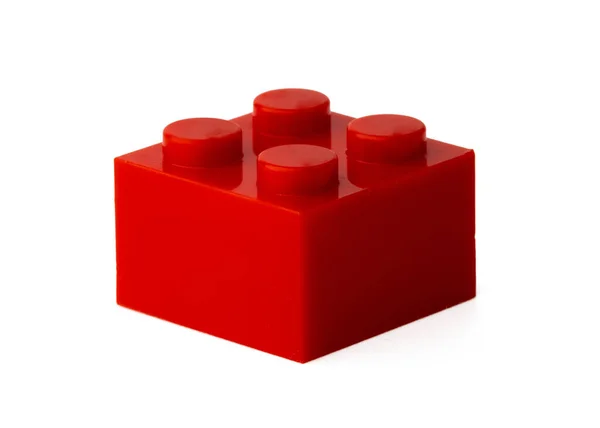 Кольоровий пластиковий іграшковий будівельний блок ізольований на білому — стокове фото