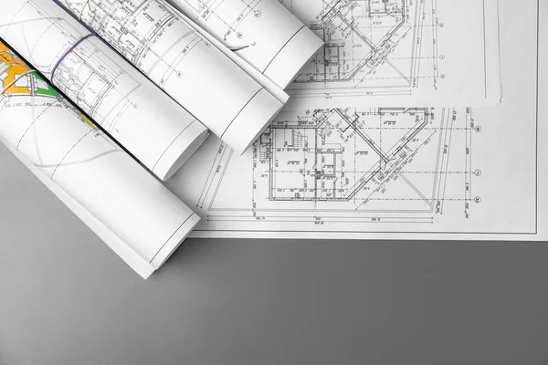 Architectuur bouwplannen papier op tafel close-up — Stockfoto