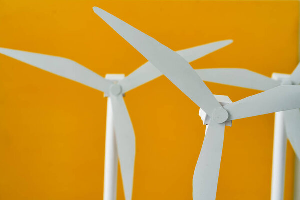 Plastic windmill model propeller indoors close up