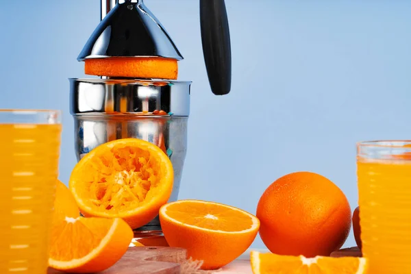 Metal hand orange juice squeezer close up — Stock Photo, Image