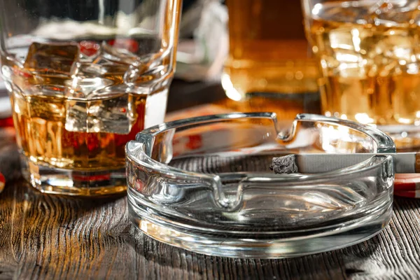 Playing poker with whiskey and cigars on table — Stock Photo, Image