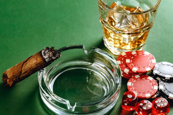 Close up of cigar and red dice cubes, gambling concept — Stock Photo, Image