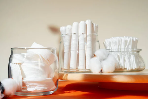 Cotton tampons and ear buds on paper background — Stock Photo, Image