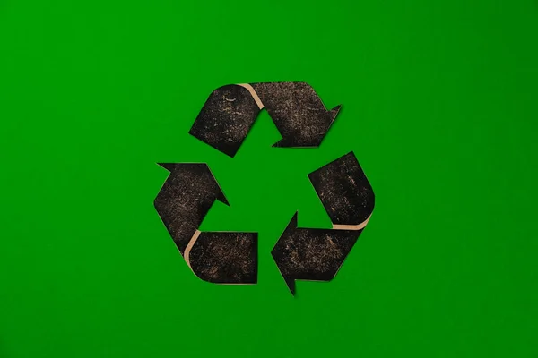 Paper recycling concept on green background top view — Stock Photo, Image