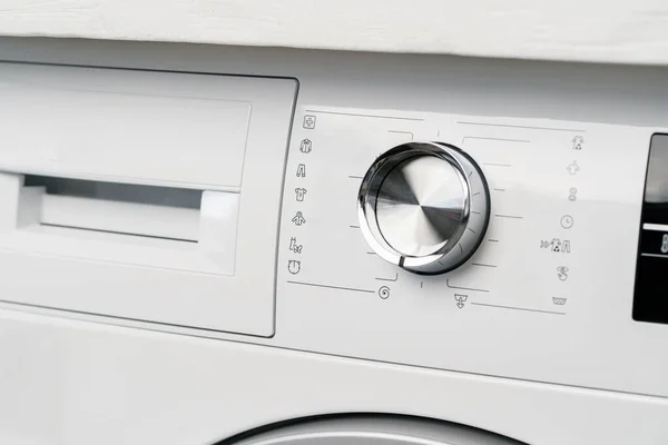 New washing machine in a home appliances store — Stock Photo, Image