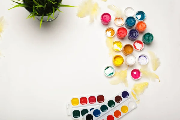 Top view of Watercolor Painting Supplies, Brushes and Colorful Pencil. Creation process of watercolor painting. Copy space. — Stock Photo, Image