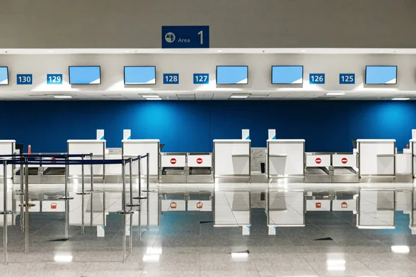 Incheckningsdiskar på flygplatsen för bakgrund, inga personer — Stockfoto